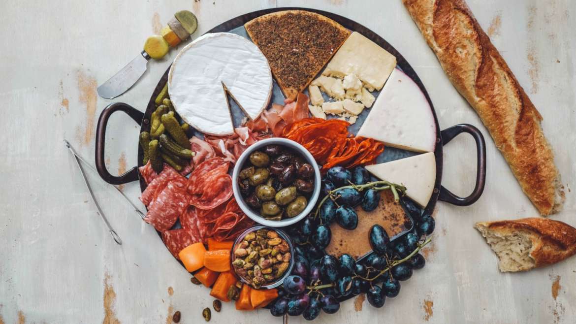 Olives, Cheeses, and Wine: Dinner Party Cheese Board Tips