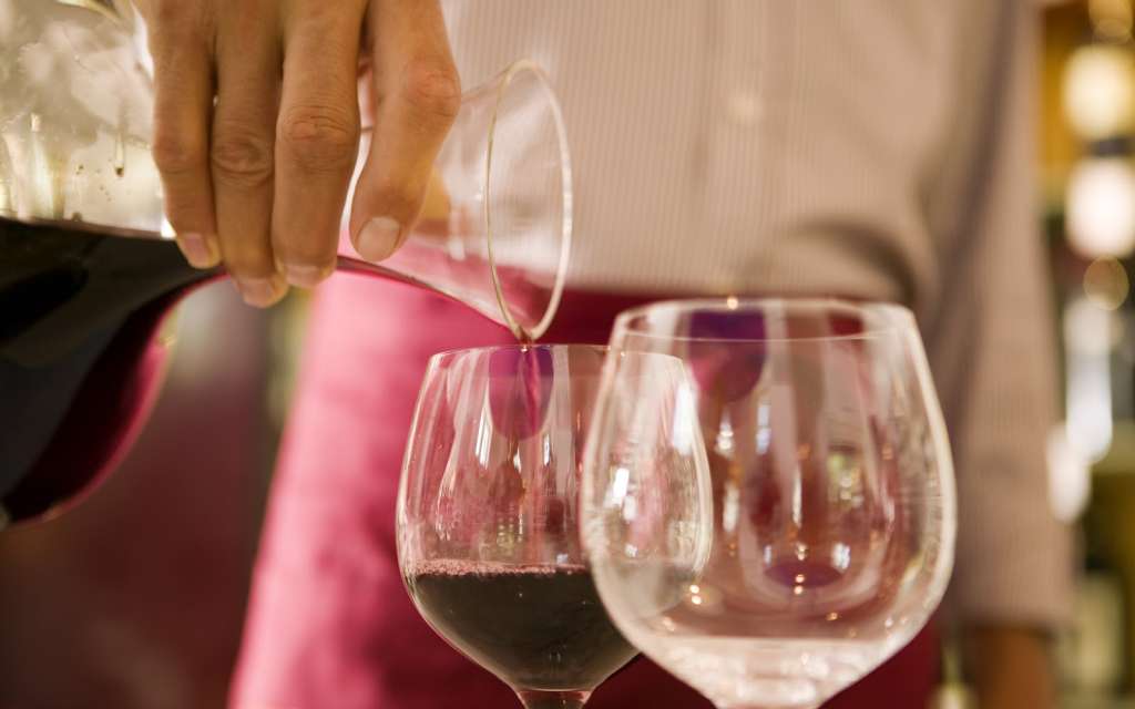 mixing wines together.